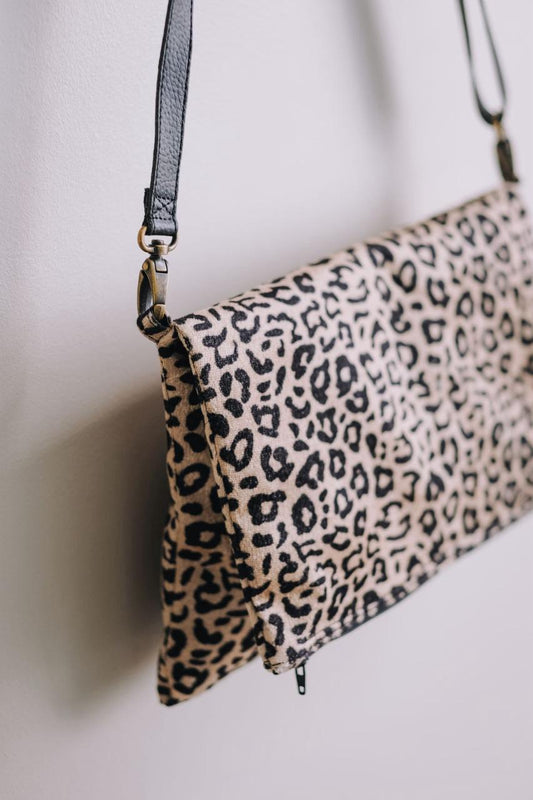 Cross-body foldover clutch