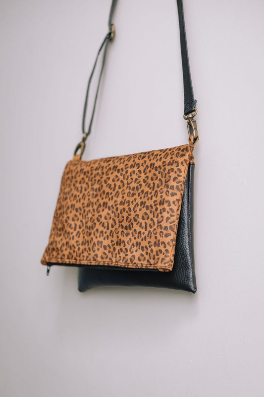 Cross-body foldover clutch