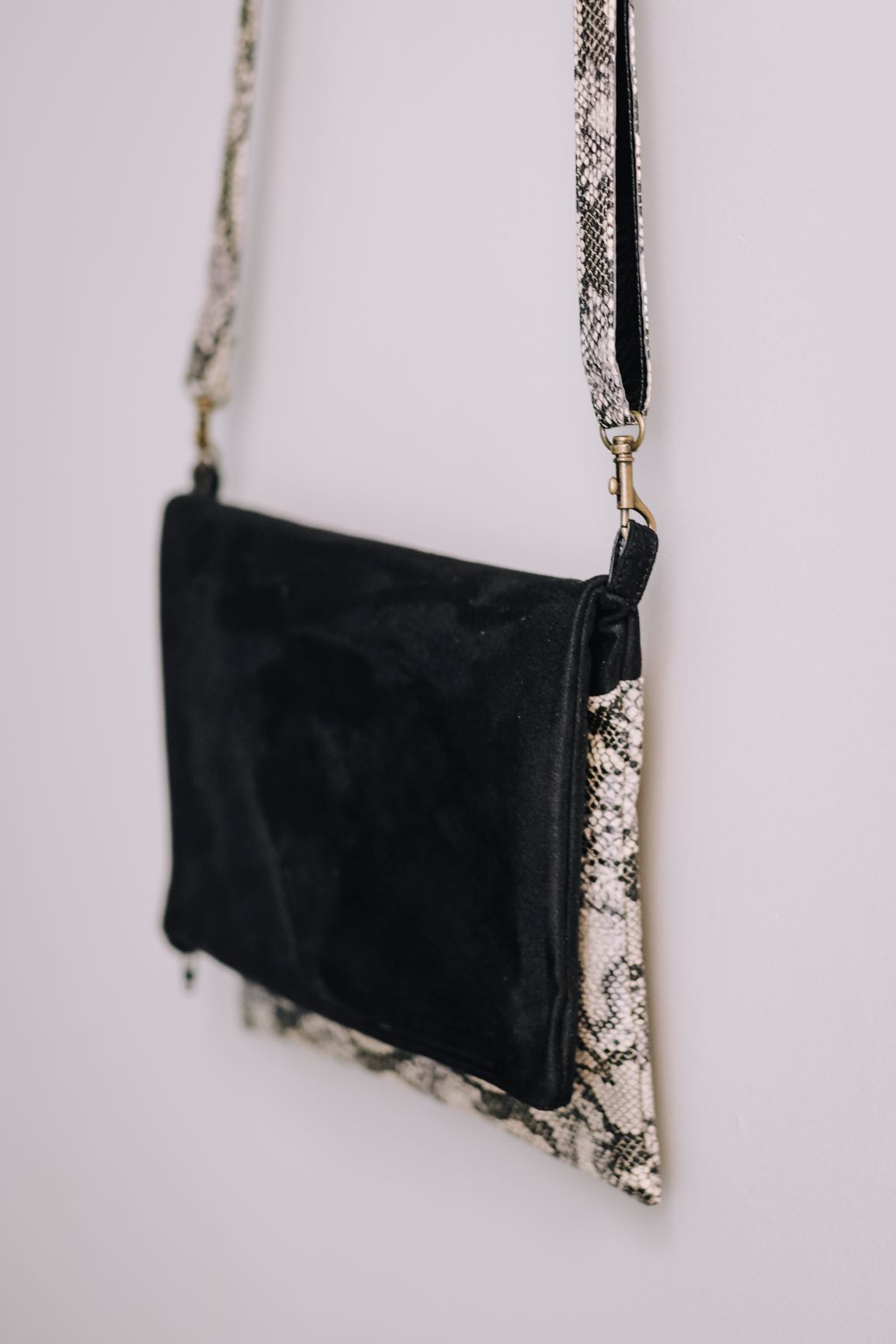 Cross-body foldover clutch