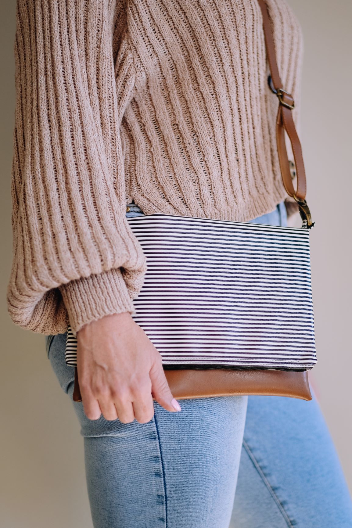 Cross-body foldover clutch