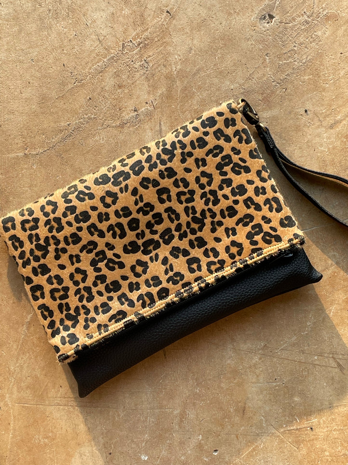 Cross-body foldover clutch