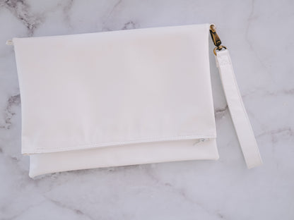 Cross-body foldover clutch