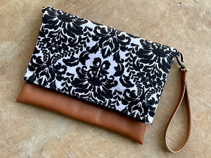 Cross-body foldover clutch