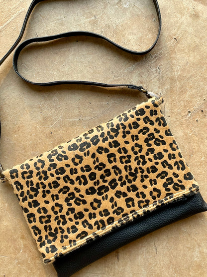 Cross-body foldover clutch