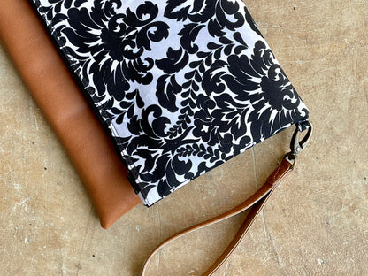 Cross-body foldover clutch