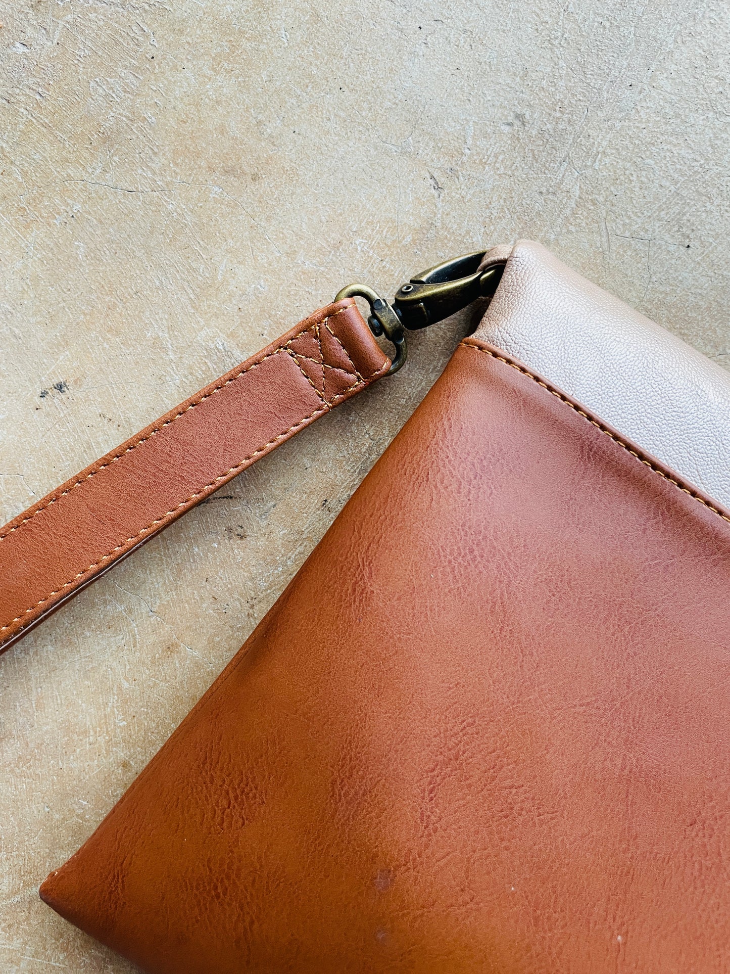 Cross-body foldover clutch