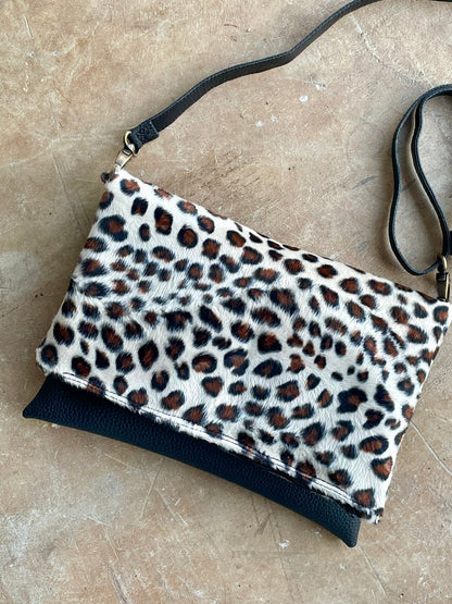 Cross-body foldover clutch